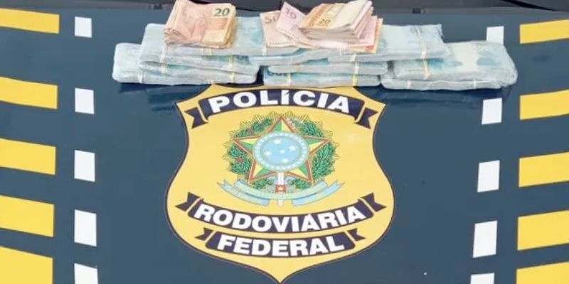 CONQUISTA: Jovem de 23 anos � levada para a delegacia com R$ 100 mil preso no corpo